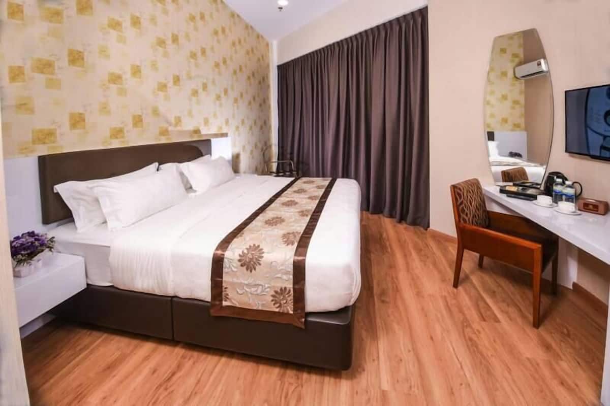 Deluxe kamer, 1 kingsize bed | Een strijkplank/strijkijzer, gratis wifi