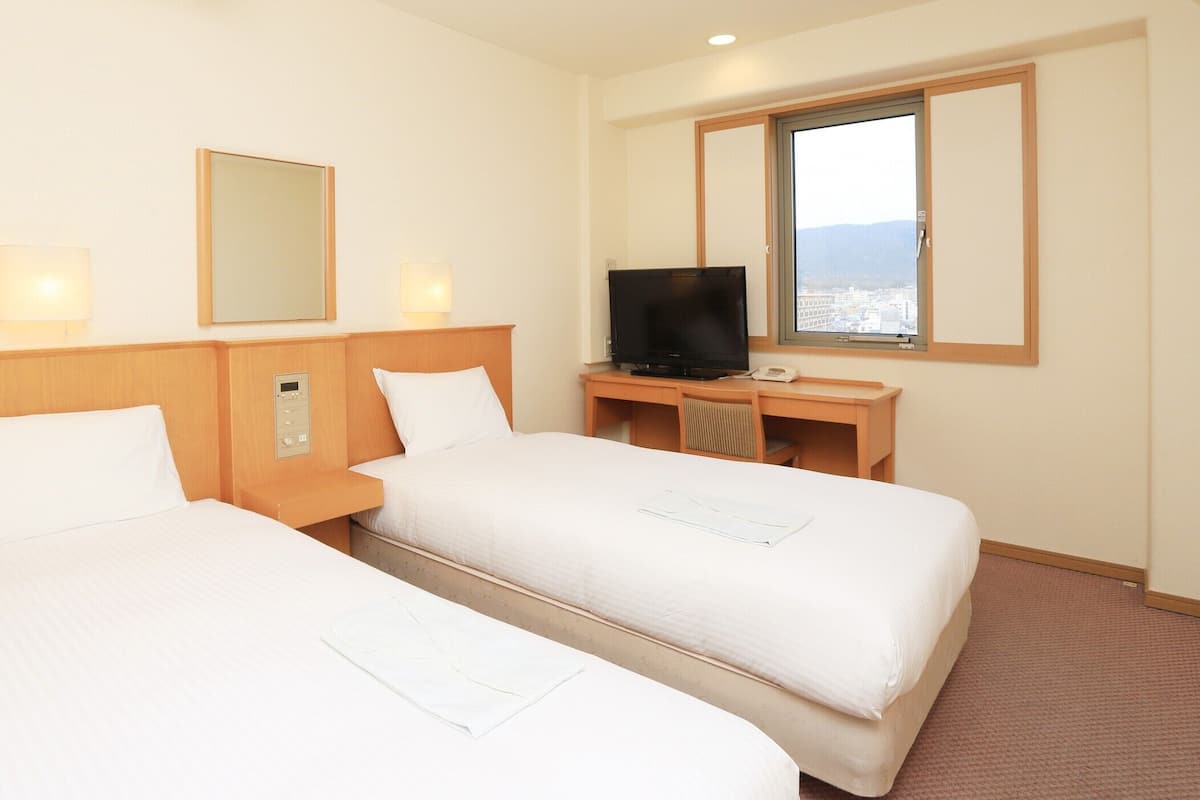 Down comforters, desk, laptop workspace, WiFi (free)