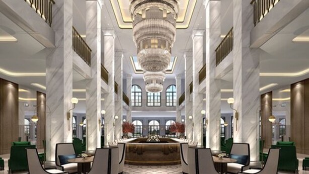 A spacious lobby with a central reception desk, high ceilings, and a grand chandelier. - PRIMUS Hotel Wuhan Hannan (Wuhan)