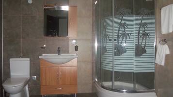 Shower, free toiletries, hair dryer, bathrobes