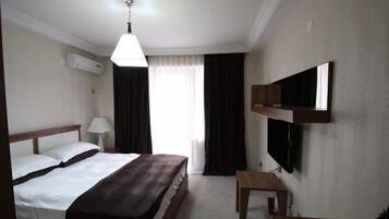 In-room safe, desk, iron/ironing board, rollaway beds