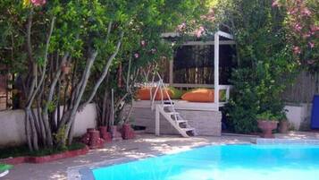 Seasonal outdoor pool, pool umbrellas, sun loungers