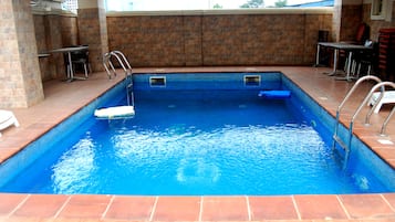 Outdoor pool, sun loungers