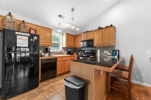 Condo, 2 Bedrooms | Private kitchen | Full-size fridge, microwave, oven, stovetop