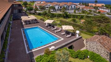 Outdoor pool, sun loungers