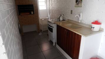 Standard Apartment, 2 Bedrooms | Private kitchen | Full-size fridge, microwave, stovetop, cookware/dishes/utensils