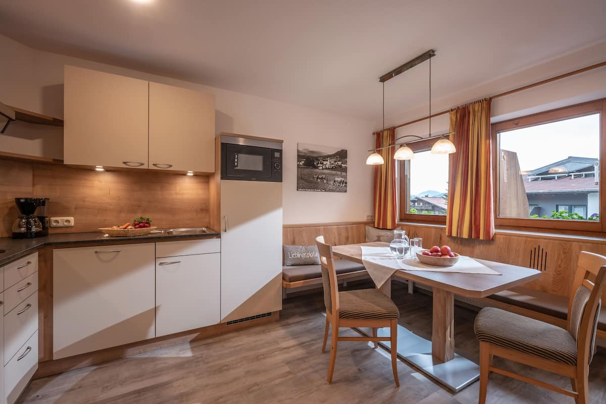 Apartment, 1 Bedroom (Kitzbuehler Horn) | Private kitchen | Full-size fridge, stovetop, dishwasher, coffee/tea maker