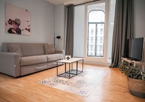 Comfort Apartment, 1 Bedroom, Balcony | Living area | Flat-screen TV