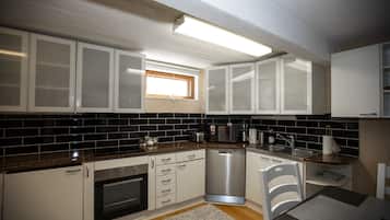 Family Apartment, 2 Bedrooms, Garden Area | Private kitchen | Full-size fridge, microwave, oven, stovetop