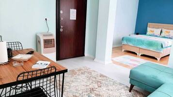 Deluxe Studio, 1 Queen Bed with Sofa bed | Premium bedding, desk, blackout curtains, iron/ironing board