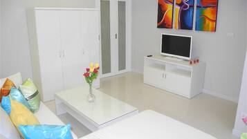 Televisión de pantalla plana, reproductor de DVD