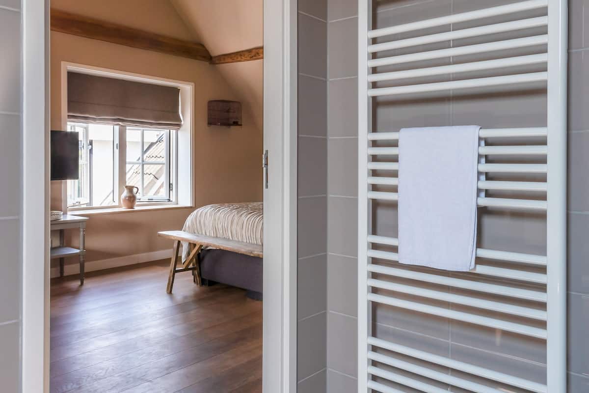 suite | bathroom | free toiletries, hair dryer, slippers, towels