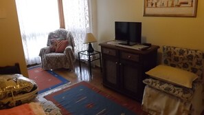 Apartamento | Sala de estar | TV