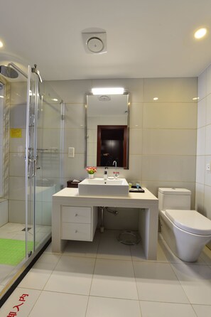 Shower, free toiletries, hair dryer, slippers