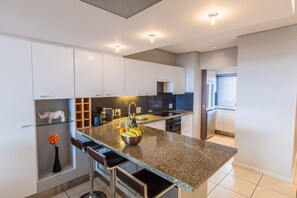 Superior Apartment, 3 Bedrooms | Private kitchen | Full-sized fridge, microwave, oven, stovetop - SleepSweet Harbouredge (Cape Town)