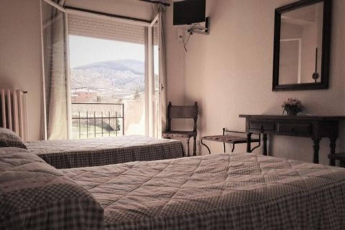 Traditional Twin Room, 2 Single Beds, Private Bathroom, Mountain View | Desk, blackout curtains, cots/infant beds, rollaway beds