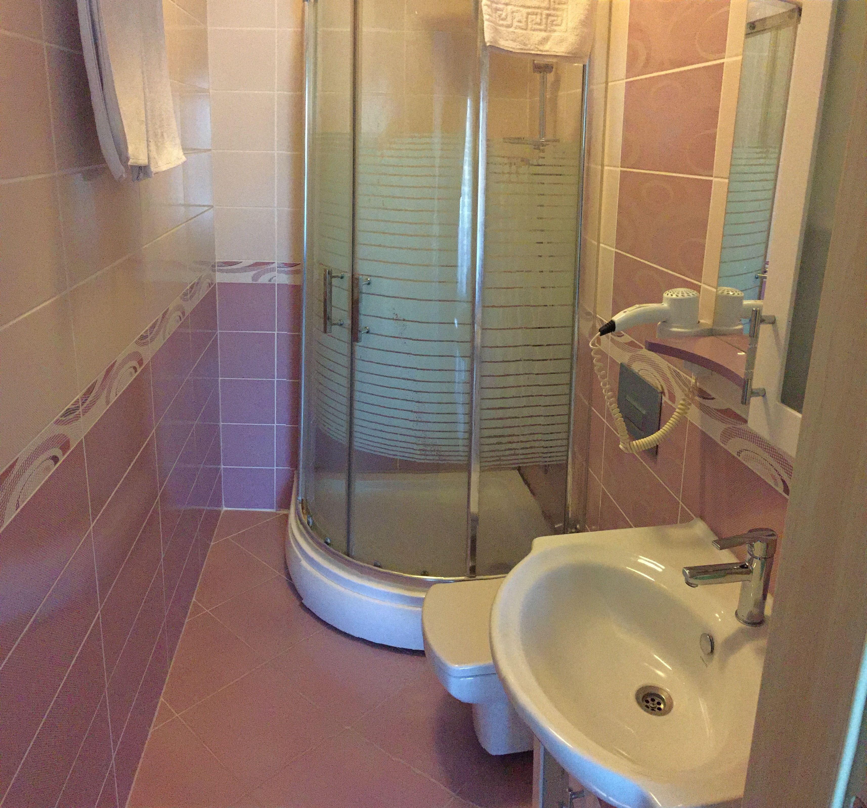 free toiletries, hair dryer, slippers, towels