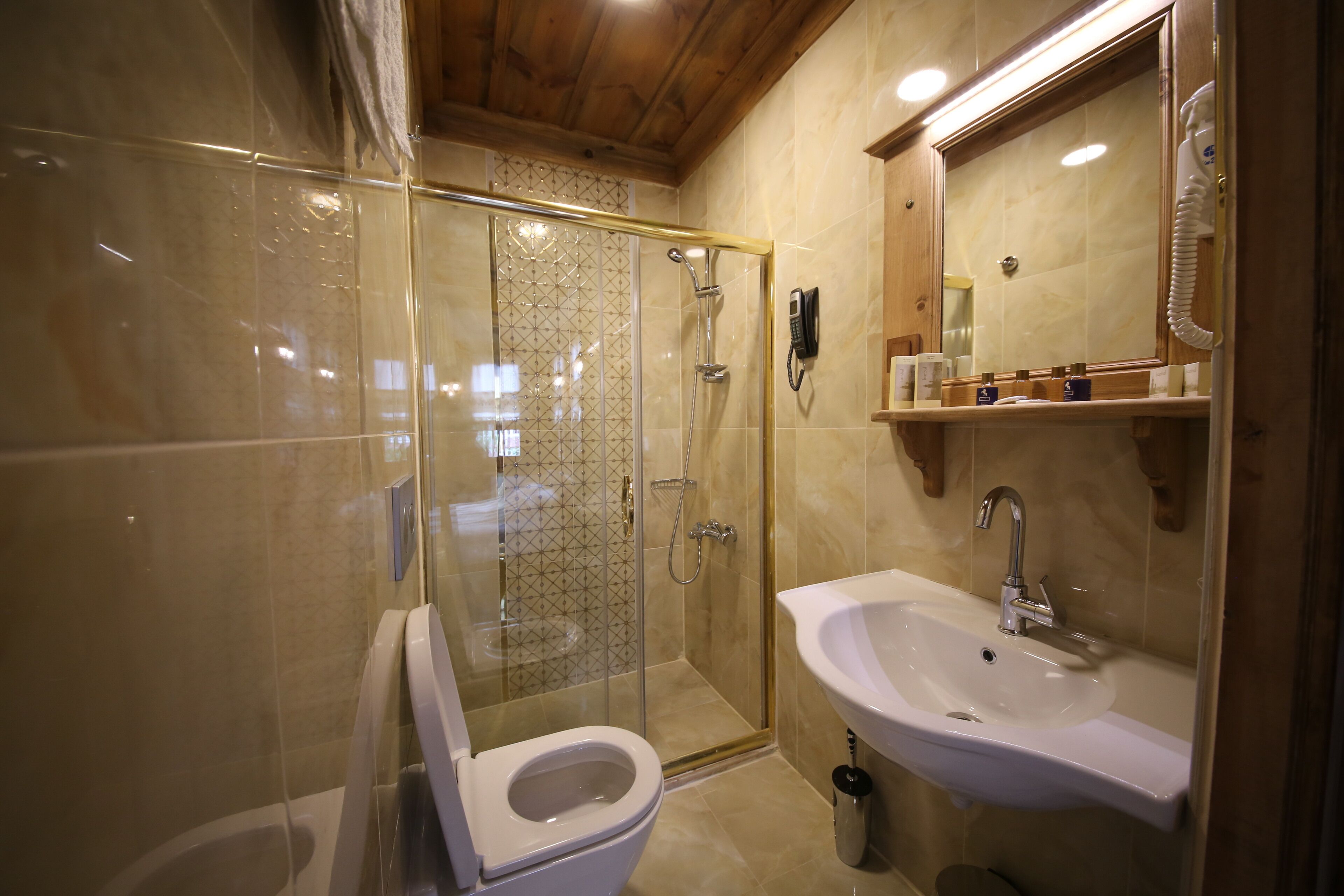 Shower, free toiletries, hair dryer, slippers