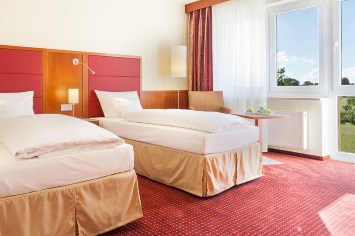 double or twin room | in-room safe, desk, laptop workspace, blackout curtains