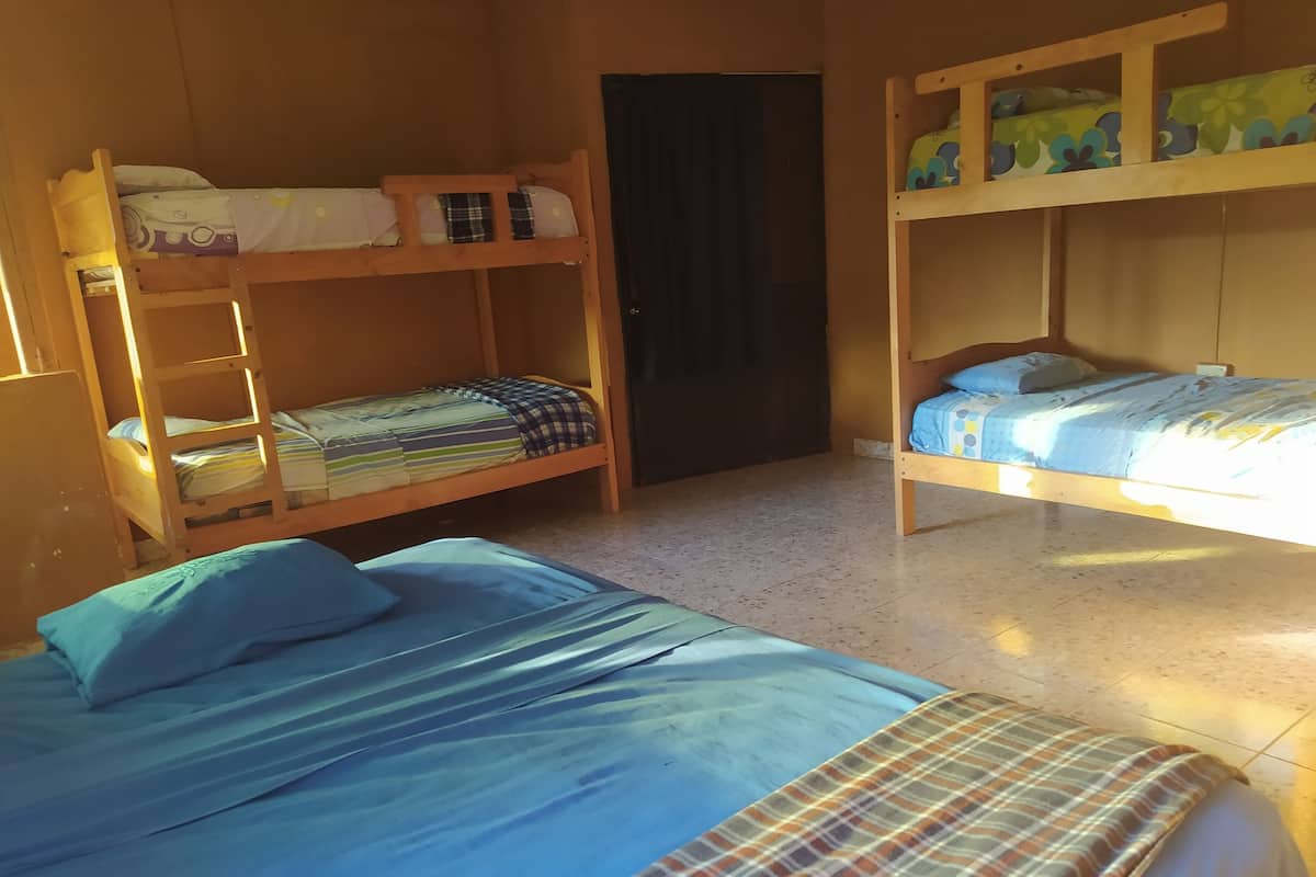 Family Room, Multiple Beds, Private Bathroom, Pool View | Desk, iron/ironing board, free WiFi, bed sheets