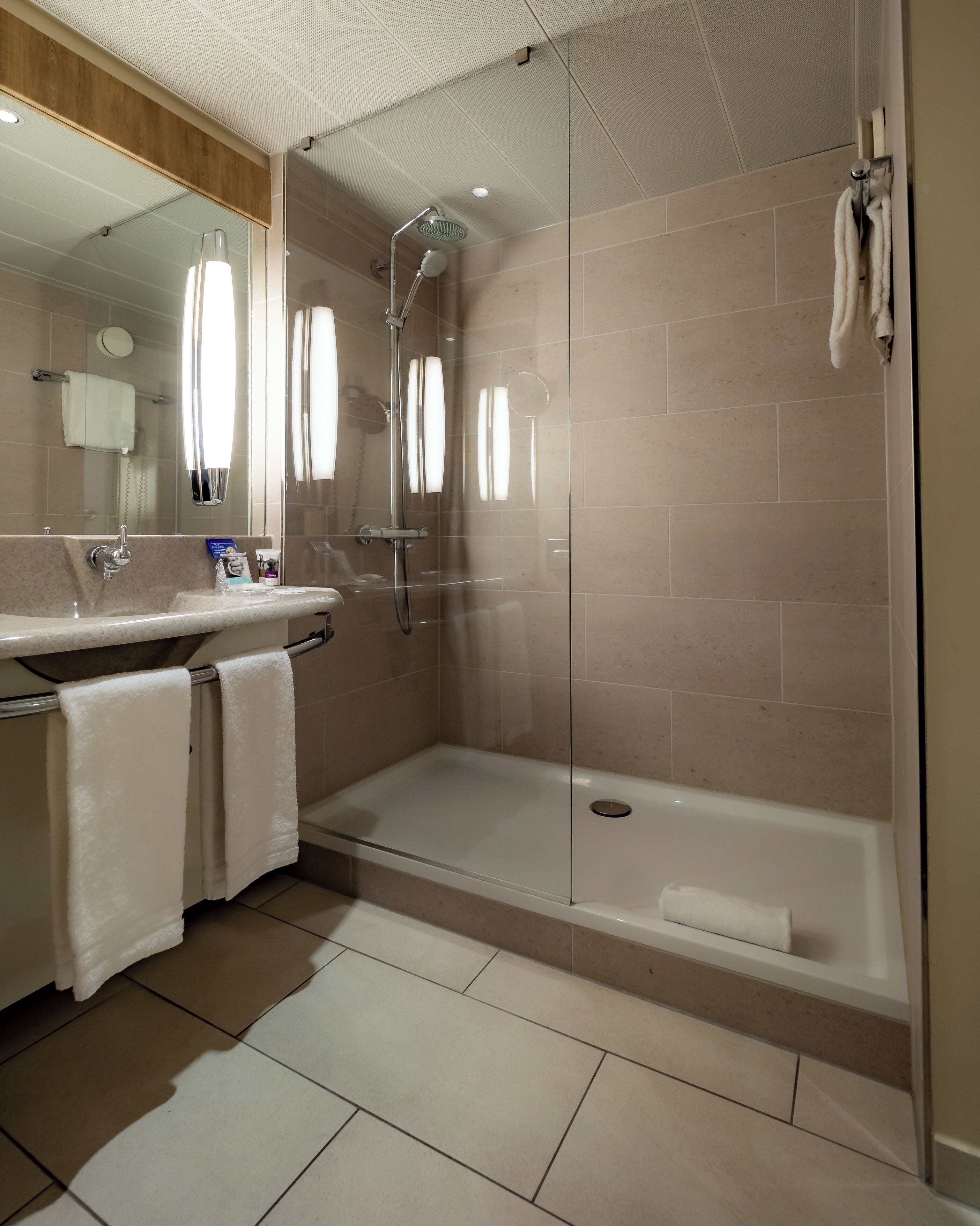 shower, free toiletries, hair dryer, towels