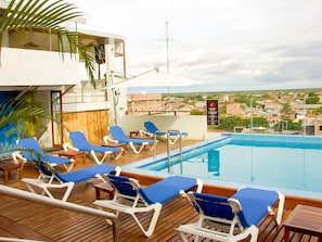 Outdoor pool, sun loungers
