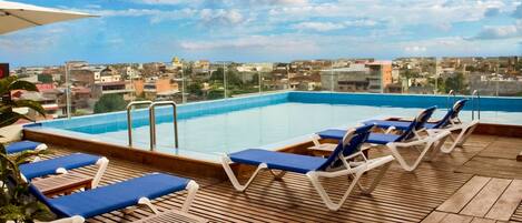 Outdoor pool, sun loungers