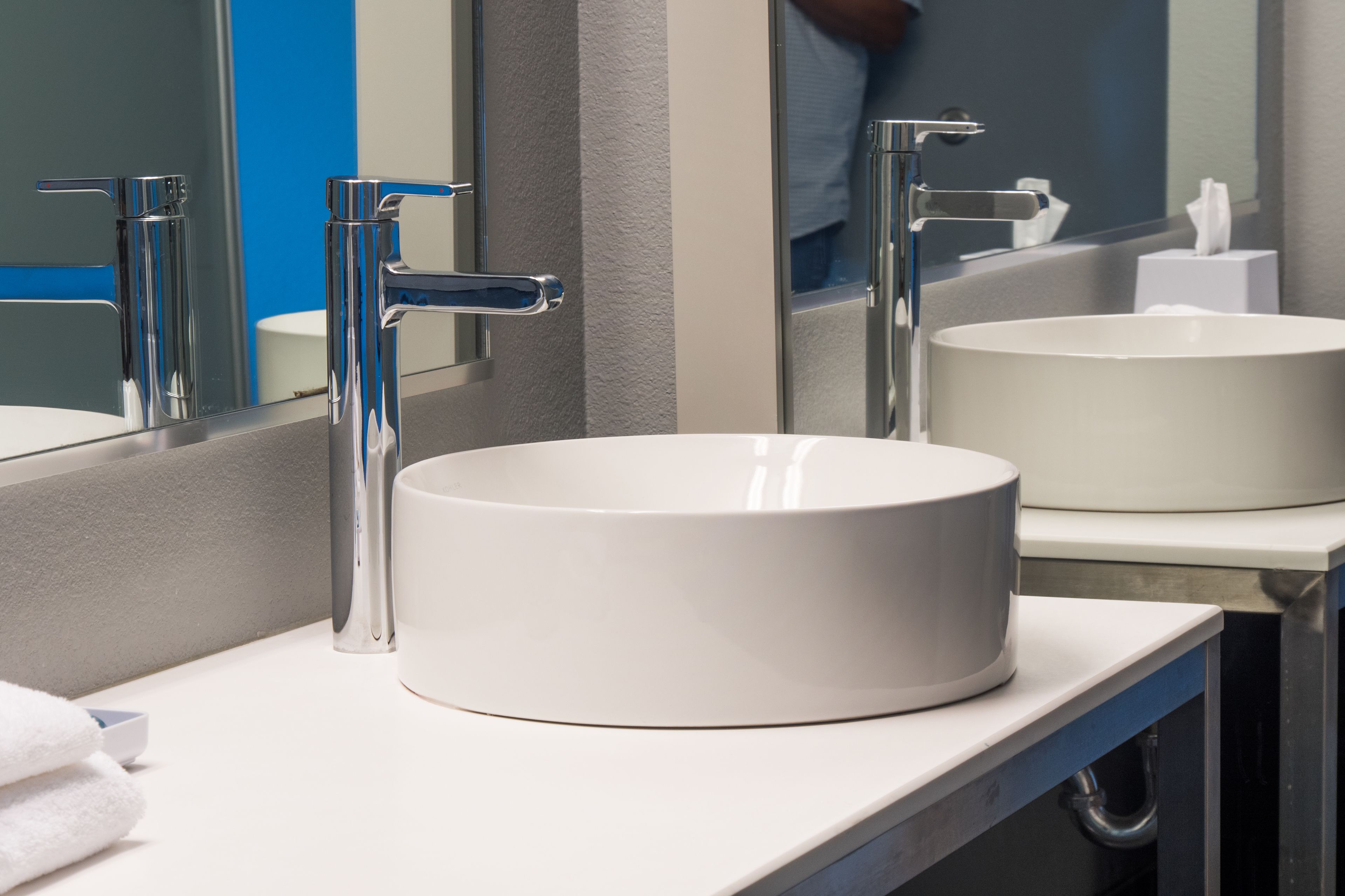 combined shower/bathtub, designer toiletries, hair dryer, towels