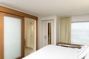 Suite, 1 King Bed with Sofa bed, Non Smoking (Hearing Accessible) | Pillowtop beds, desk, iron/ironing board, free cribs/infant beds