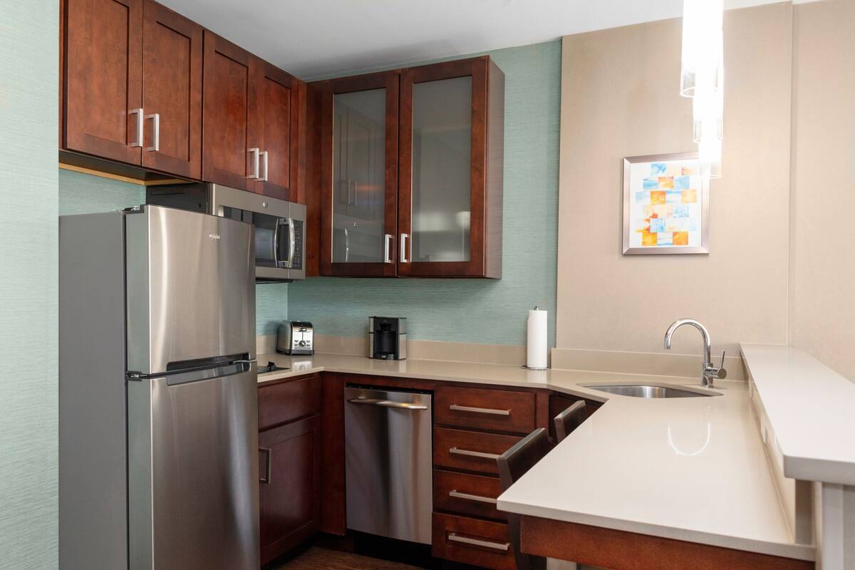 premium bedding, desk, laptop workspace, iron/ironing board