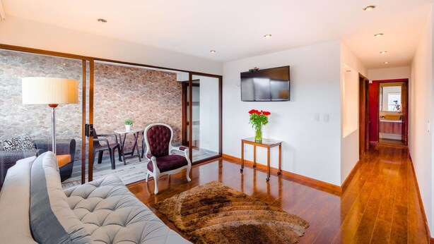 Superior Apartment, 2 Bedrooms | Living room | 32-inch flat-screen TV with satellite channels, TV