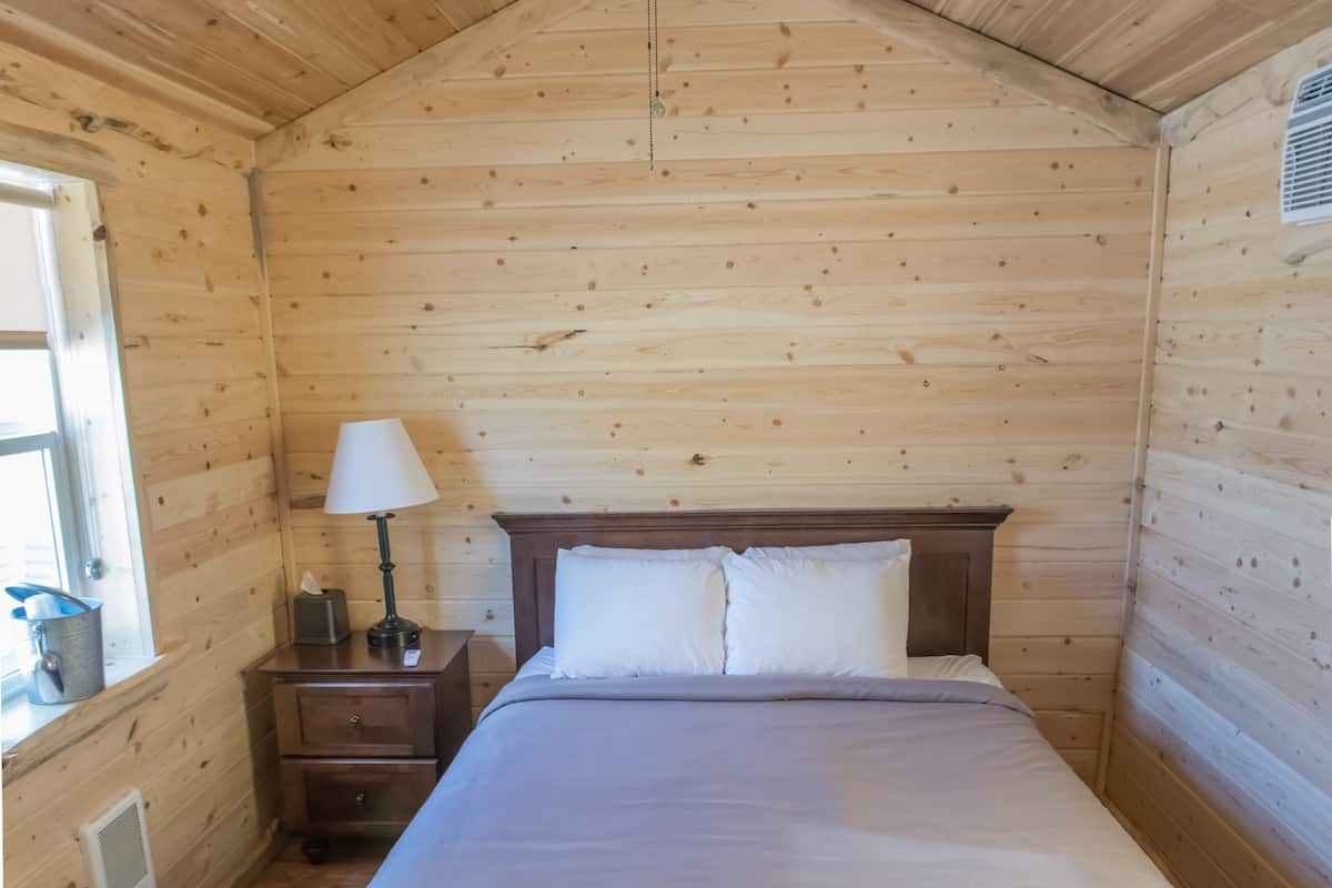 Premium Cabin, Patio, Mountain View | Cribs/infant beds, bed sheets