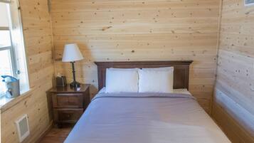 Premium Cabin, Patio, Mountain View | Cribs/infant beds, bed sheets