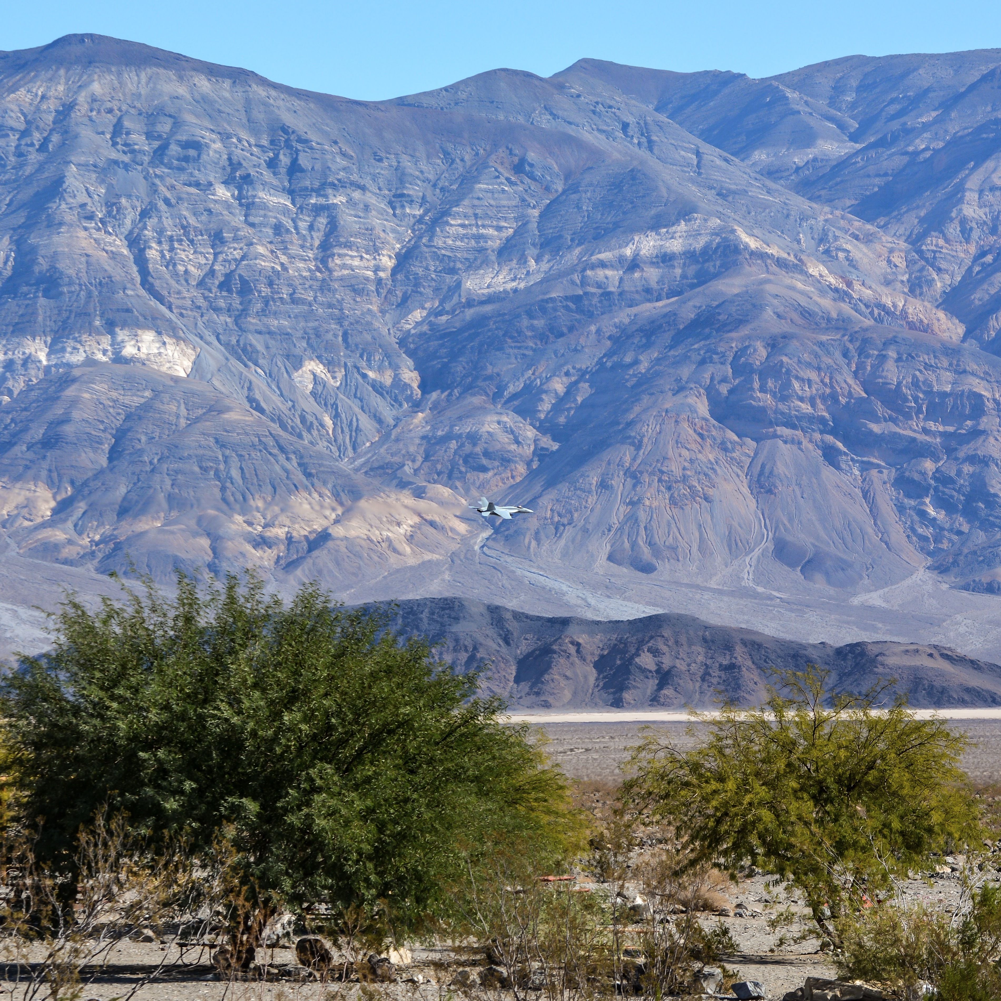 A mountainous landscape with a clear sky.