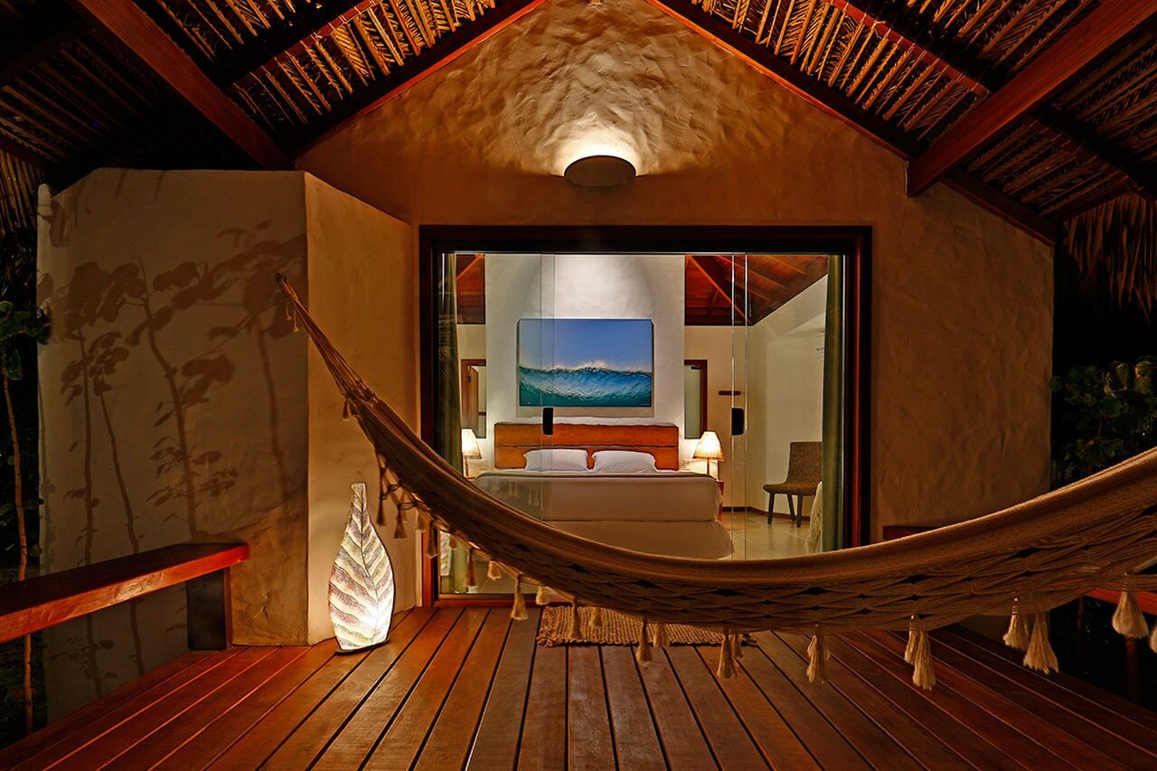 Deluxe Bungalow | Minibar, in-room safe, desk, blackout drapes