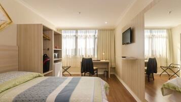 Estúdio | Frigobar, cofres nos quartos, escrivaninha, cortinas blackout