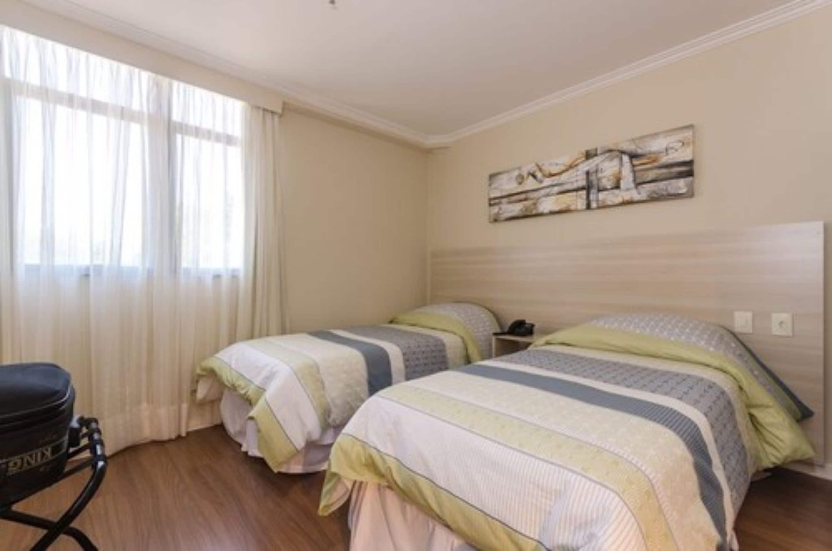 standard twin room | minibar, in-room safe, desk, blackout curtains