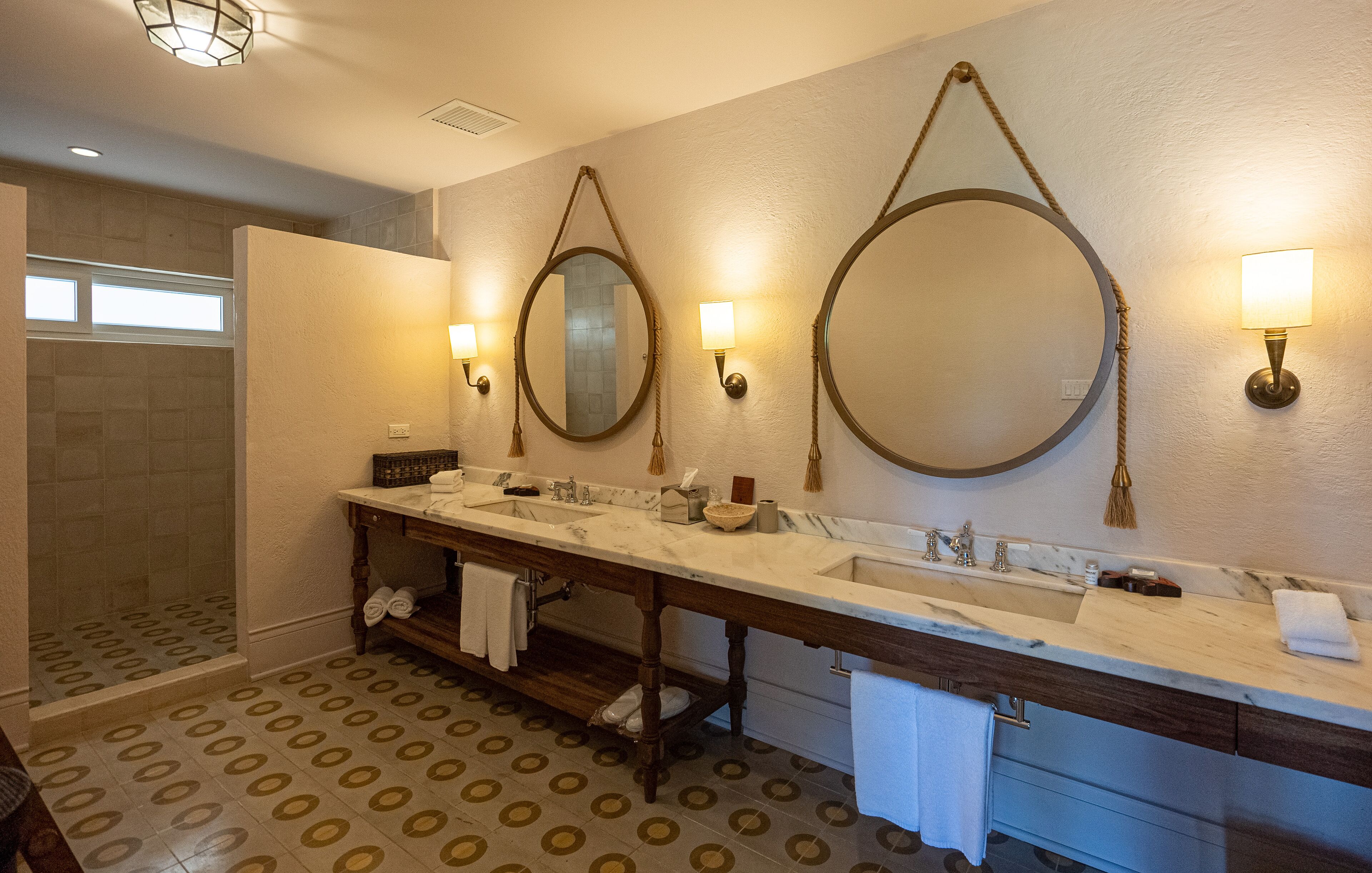 combined shower/bathtub, hair dryer, bathrobes, towels