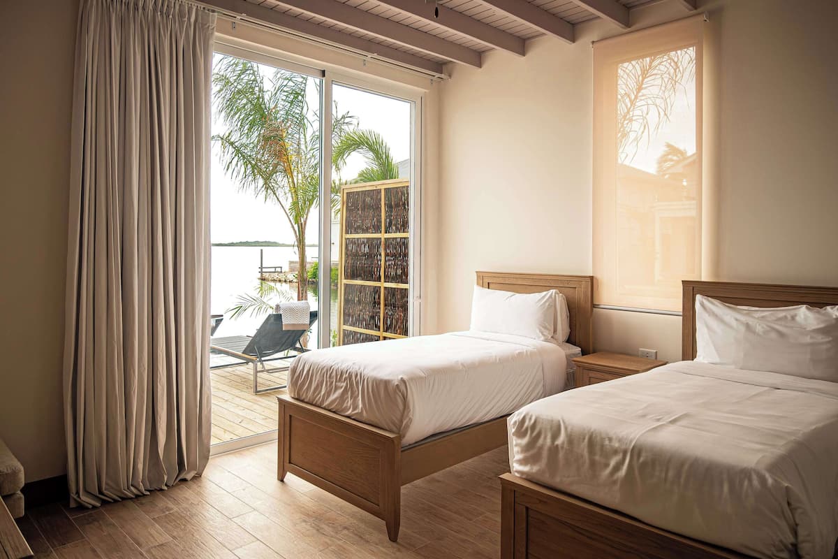 One Bedroom Beachfront Villa | 1 dormitorio, sábanas de algodón egipcio, ropa de cama de alta calidad