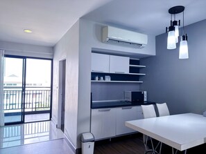 Habitació executiva | Roba de llit d'alta qualitat i minibar amb articles gratuïts