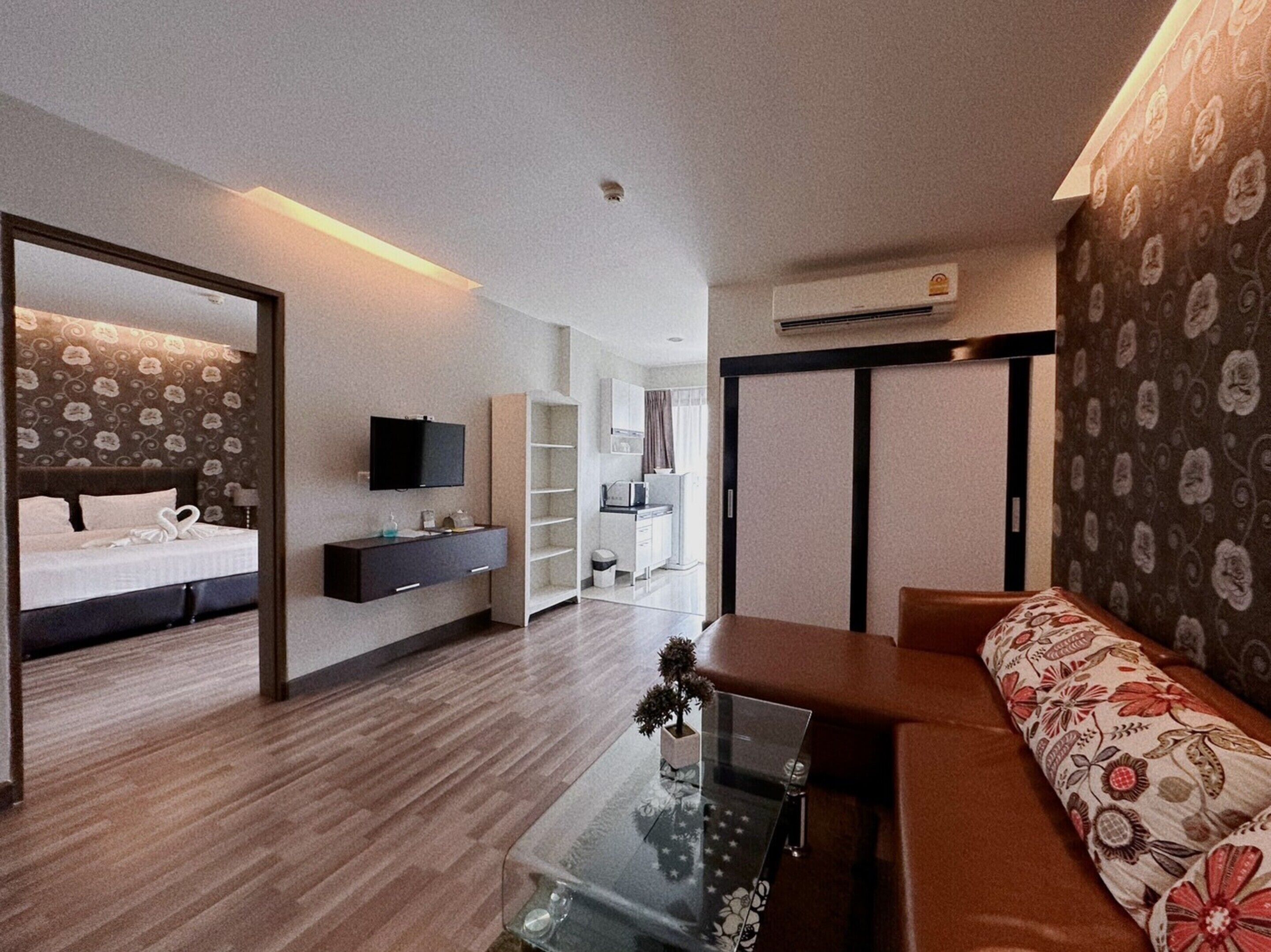 Junior-Suite | Wohnzimmer | 40-Zoll-Flachbildfernseher mit Kabelempfang, Fernseher