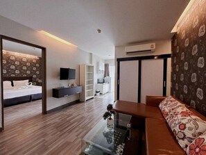 Suite – junior | Oppholdsrom | En 40-tommers Flatskjerm-TV med kabel-kanaler samt TV