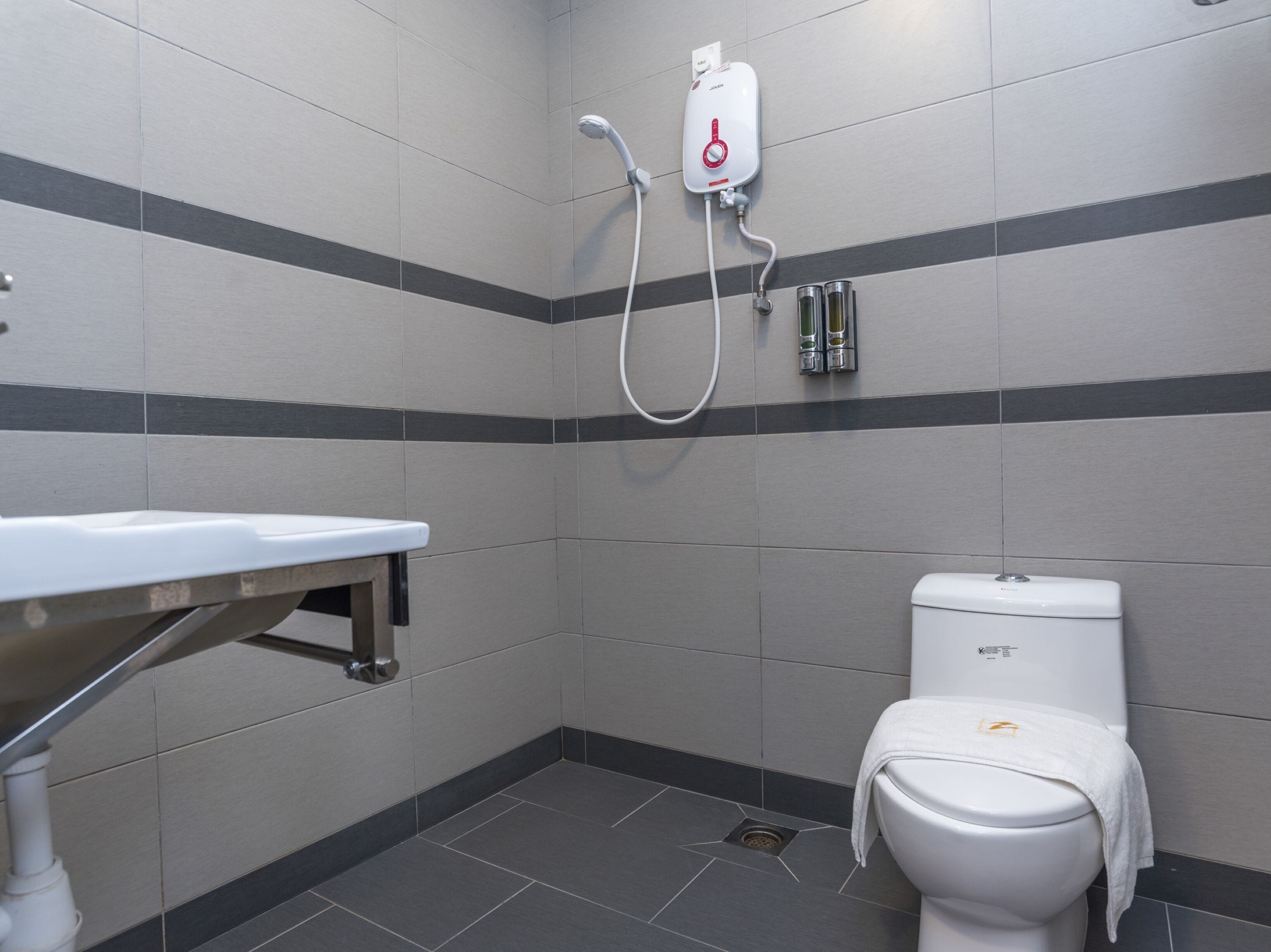 superior suite | bathroom | shower, rainfall showerhead, free toiletries, hair dryer