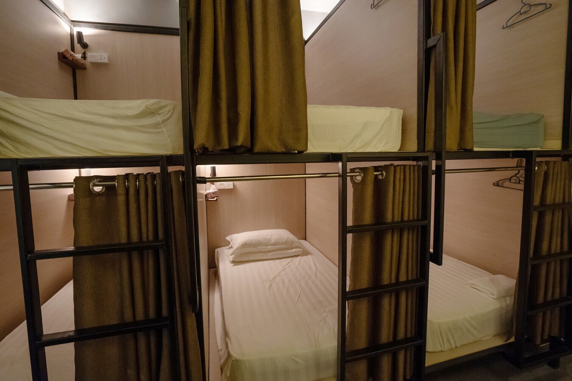 A bunk bed room with a single bed and a bunk bed.