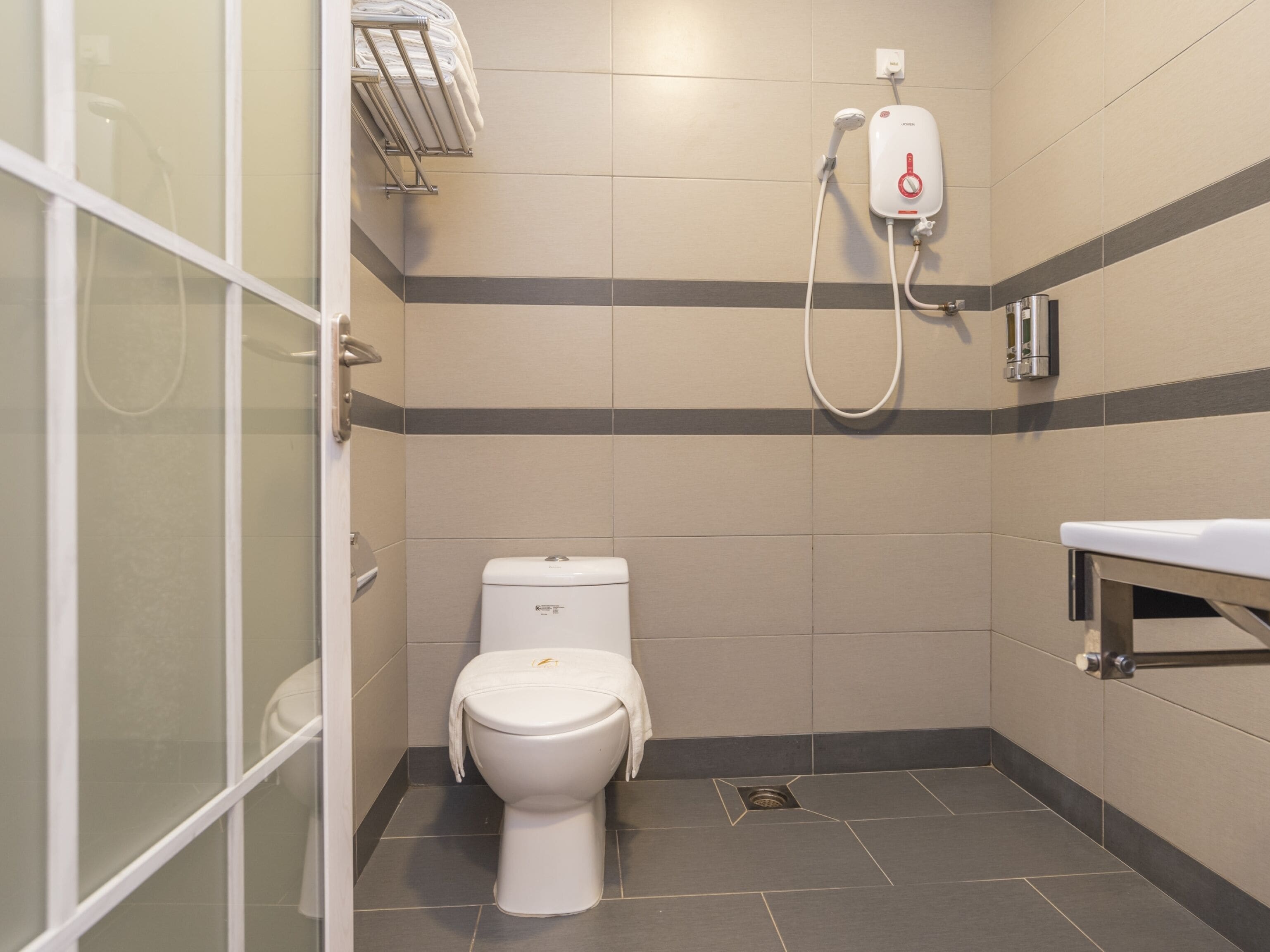 family suite | bathroom | shower, rainfall showerhead, free toiletries, hair dryer