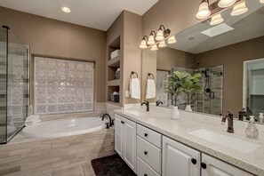 Combined shower/tub, hair dryer, towels, soap