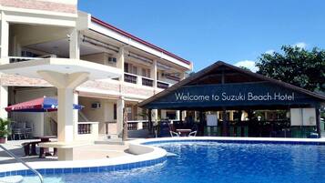 Outdoor pool, open 8 AM to 10 PM, pool umbrellas