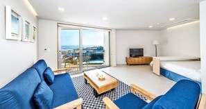 Icaria 302 | Living area | Flat-screen TV - Blanc Bleu Pension (Seogwipo)