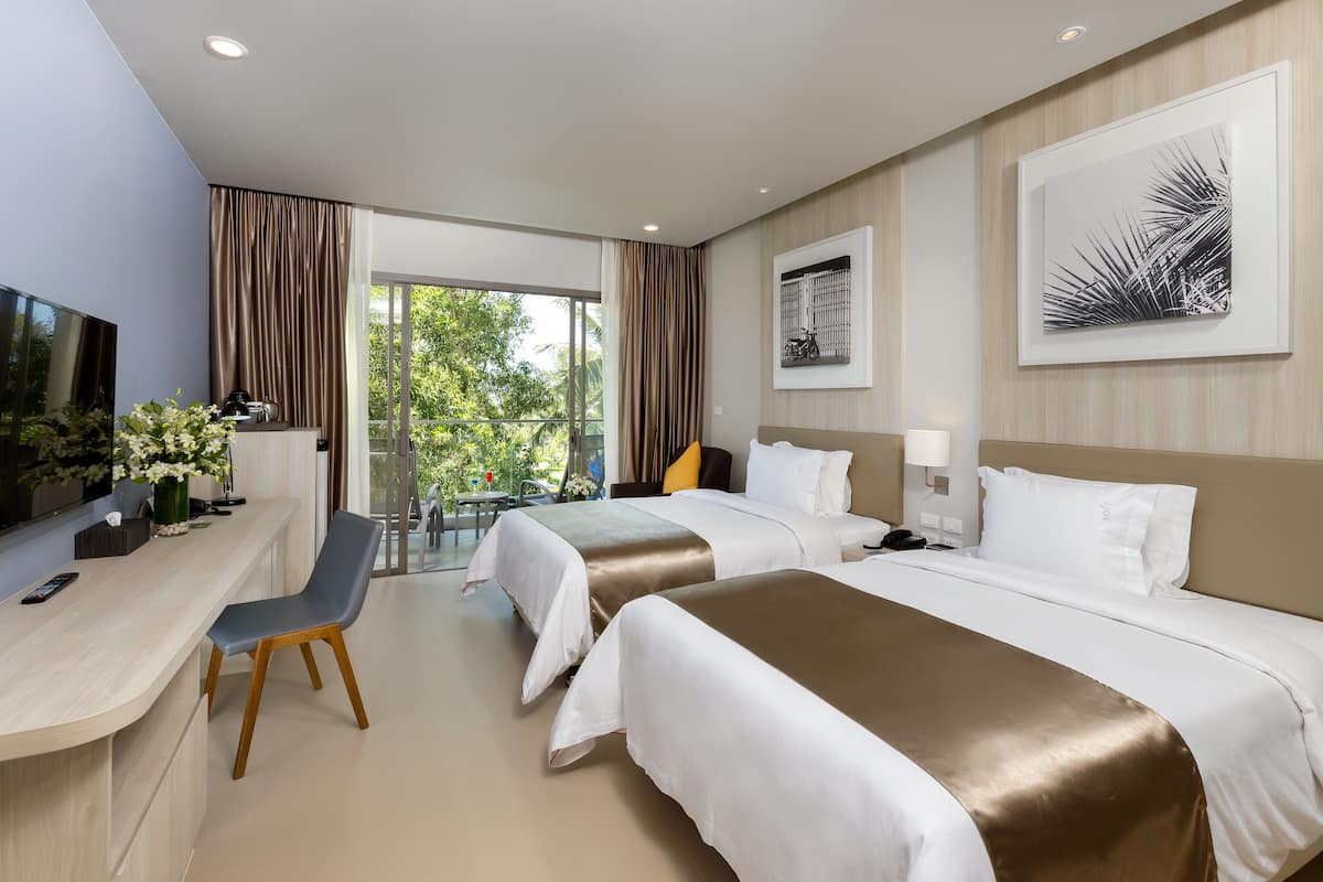 deluxe double or twin room - family wing | 2 bedrooms, hypo-allergenic bedding, in-room safe, blackout curtains