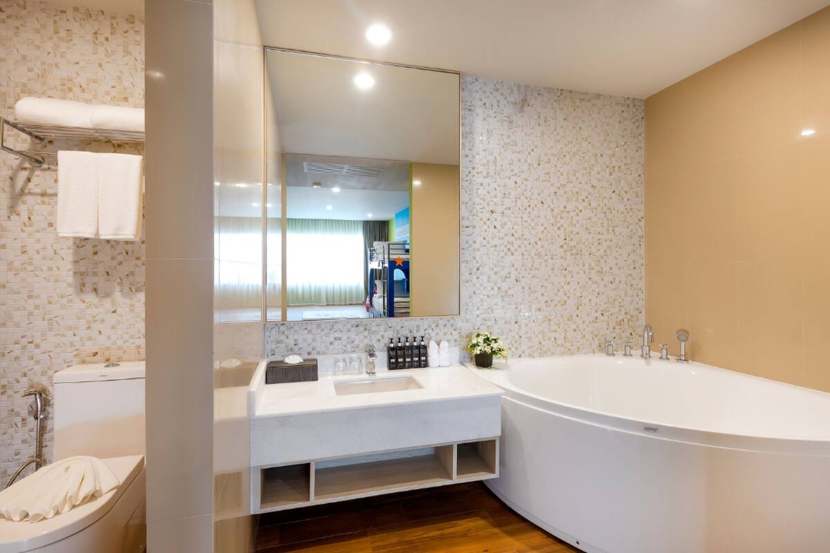 kids suite (family wing) | bathroom | shower, rainfall showerhead, designer toiletries, hair dryer